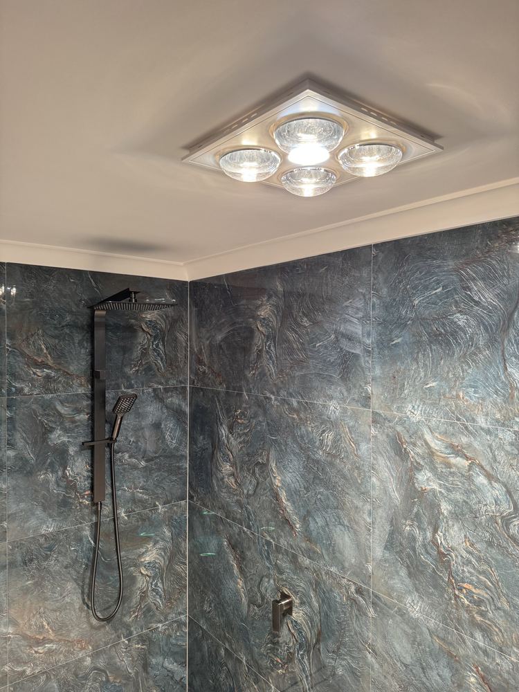 Bathroom electrical fit-off with stone feature wall